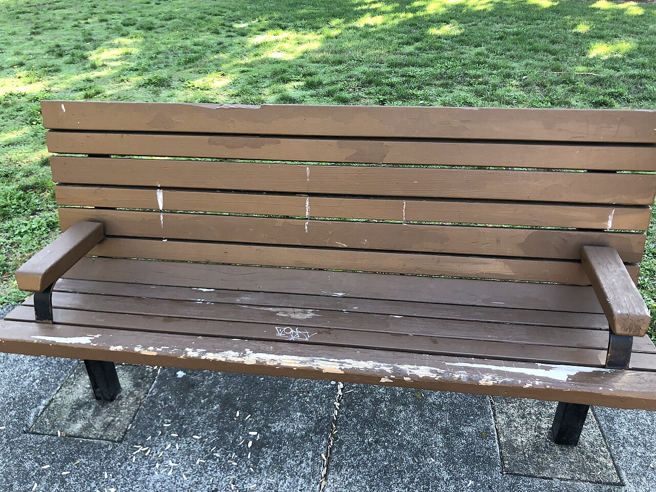 Illustrative photograph: A park bench
